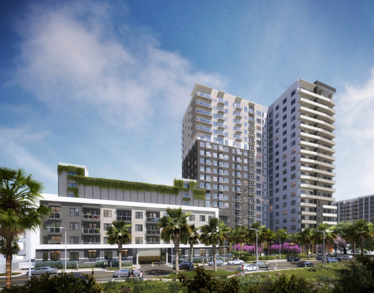 Modern residential high-rise building with lush landscaping and adjacent parking.