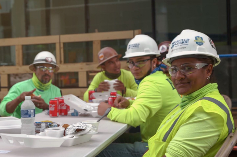 Construction workers taking a lunch break often challenge misconceptions about the construction career.