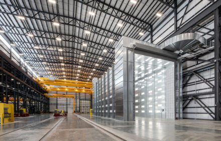 Interior of a large, modern cryogenic facility in Theodore, Alabama with high ceilings and overhead cranes