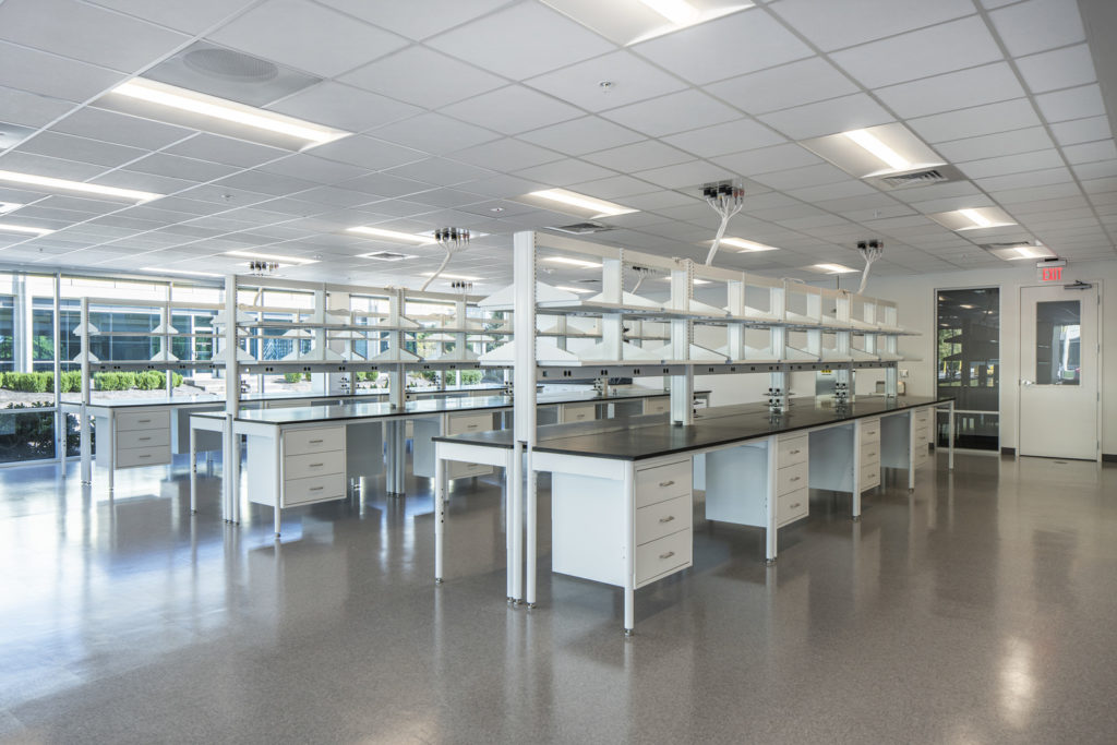 A lab space with a wall of windows