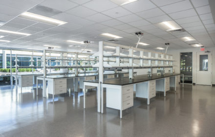 A lab space with a wall of windows