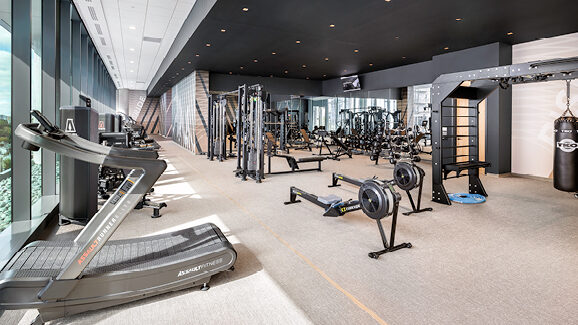 Fitness center interior at a residential tower.